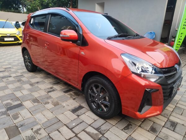 Jual Ayla X 1.2 AT 2021 Oranye - B 2477 KZI